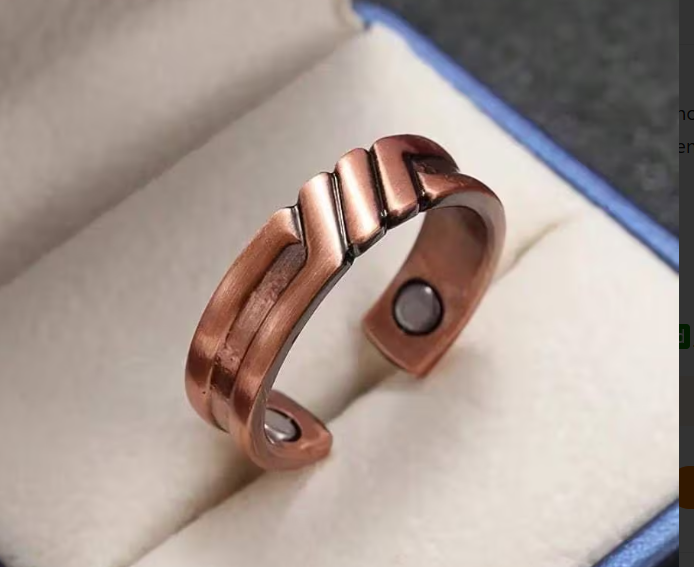Bague magnétique cuivrée avec aimants, présentée dans un écrin